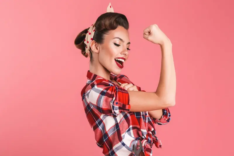 Confident woman symbolising empowerment, independence, and self-confidence in a high-class escort role