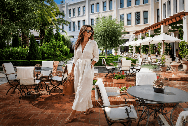 High-end escort companion on the terrace of The Westin Valencia, one of the city's luxury hotels

